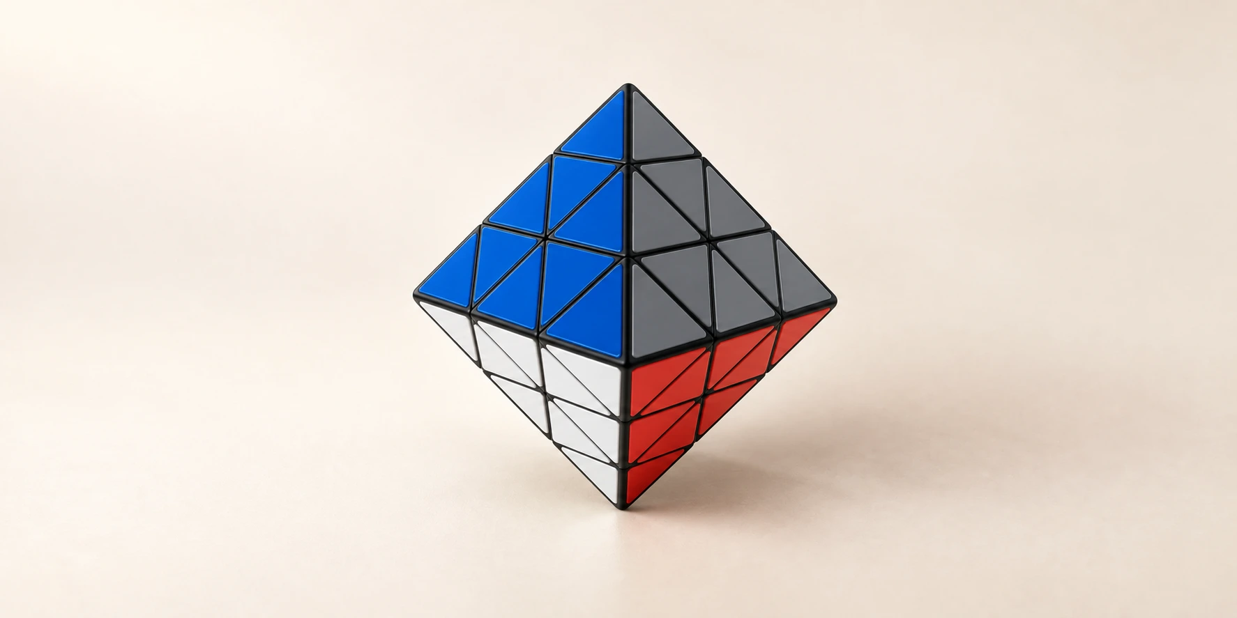A face-turning octahedron on a warm ivory background